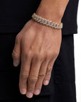 Model wearing 13mm 18k gold ice prong cuban bracelet by Iceman Society