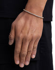 Model wearing 3mm 18K gold ice sparkler tennis chain set by Iceman Society, side view