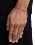 Model wearing 4mm white gold rope chain set by Iceman Society, side view