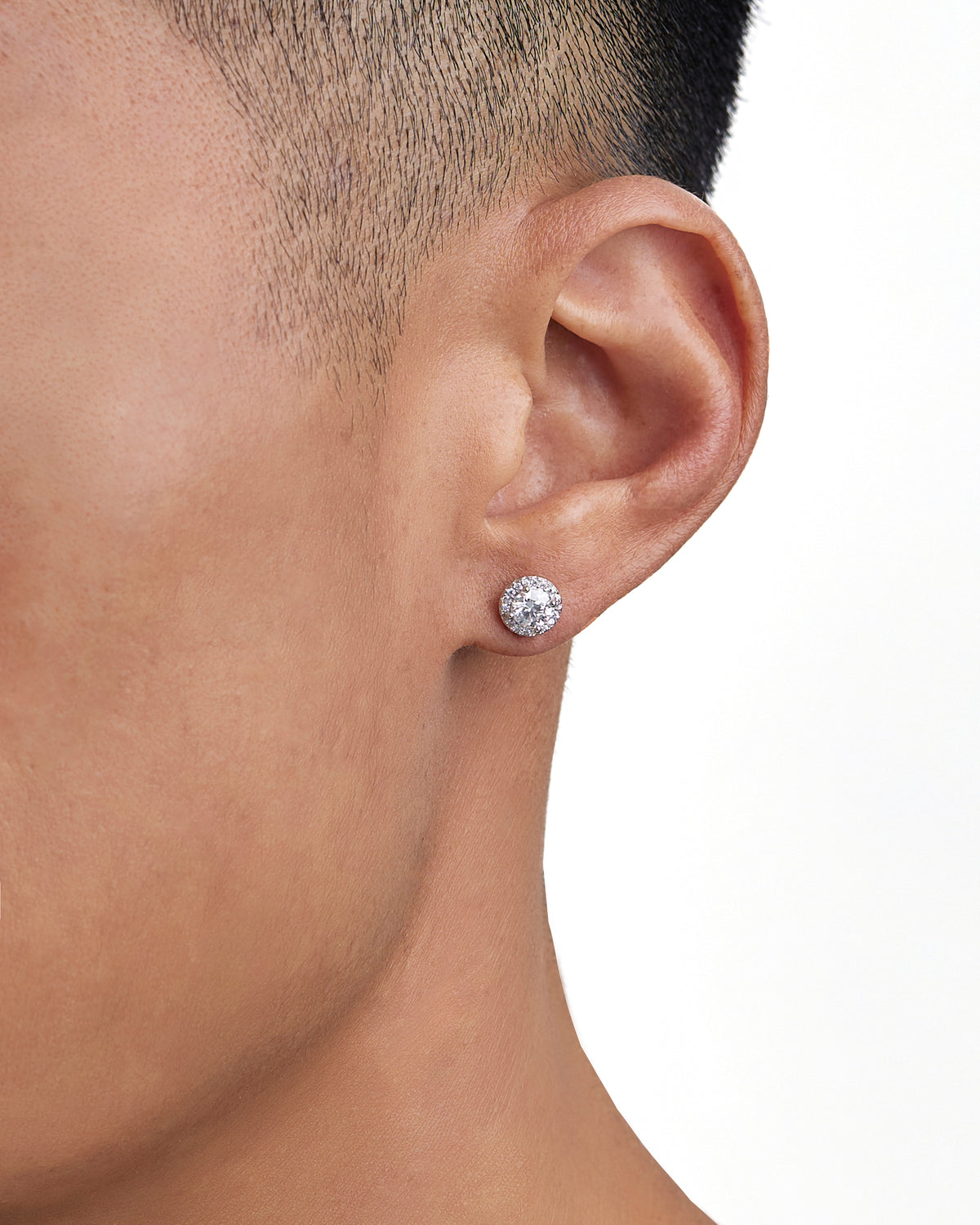 Model wearing moissanite earrings by Iceman Society
