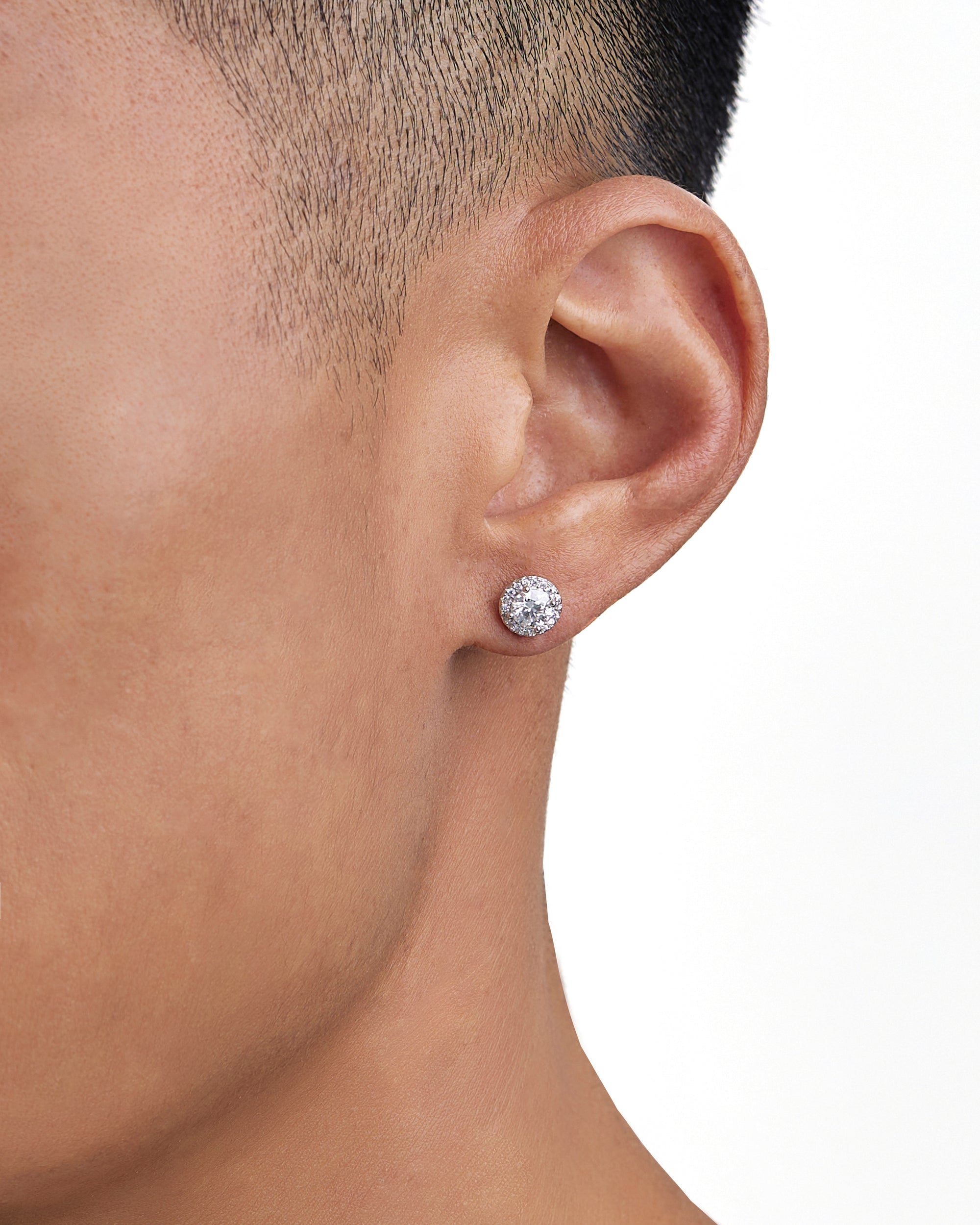Model wearing moissanite earrings by Iceman Society