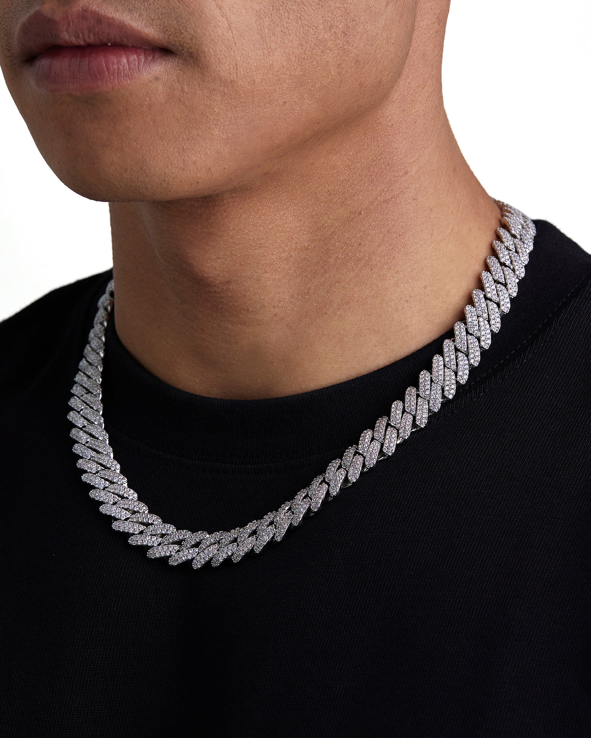 Model wearing 13mm white gold ice prong cuban necklace by Iceman Society, side view