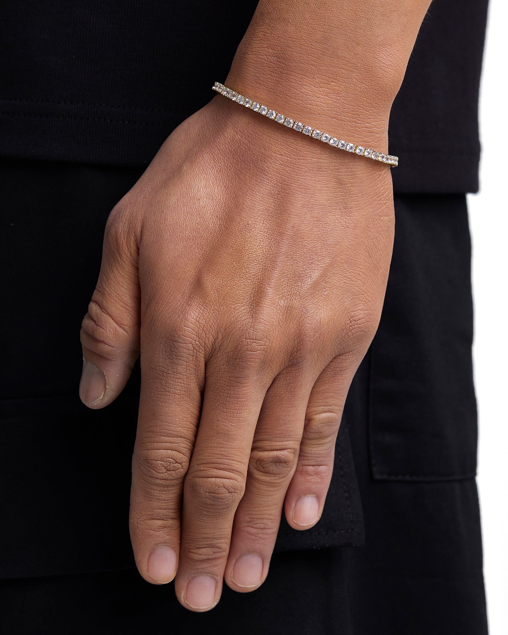 Model wearing 3mm 18K gold ice sparkler tennis chain set by Iceman Society, side view