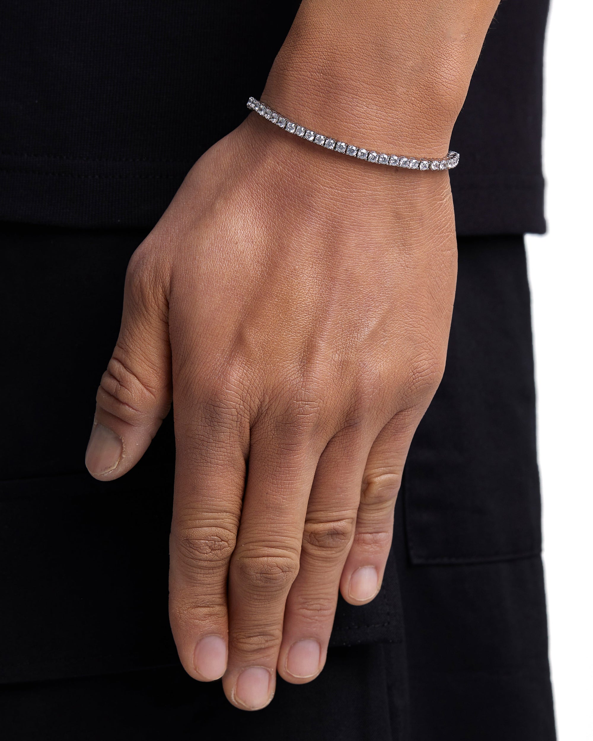 Model wearing 3mm white gold ice sparkler tennis chain set by Iceman Society, side view