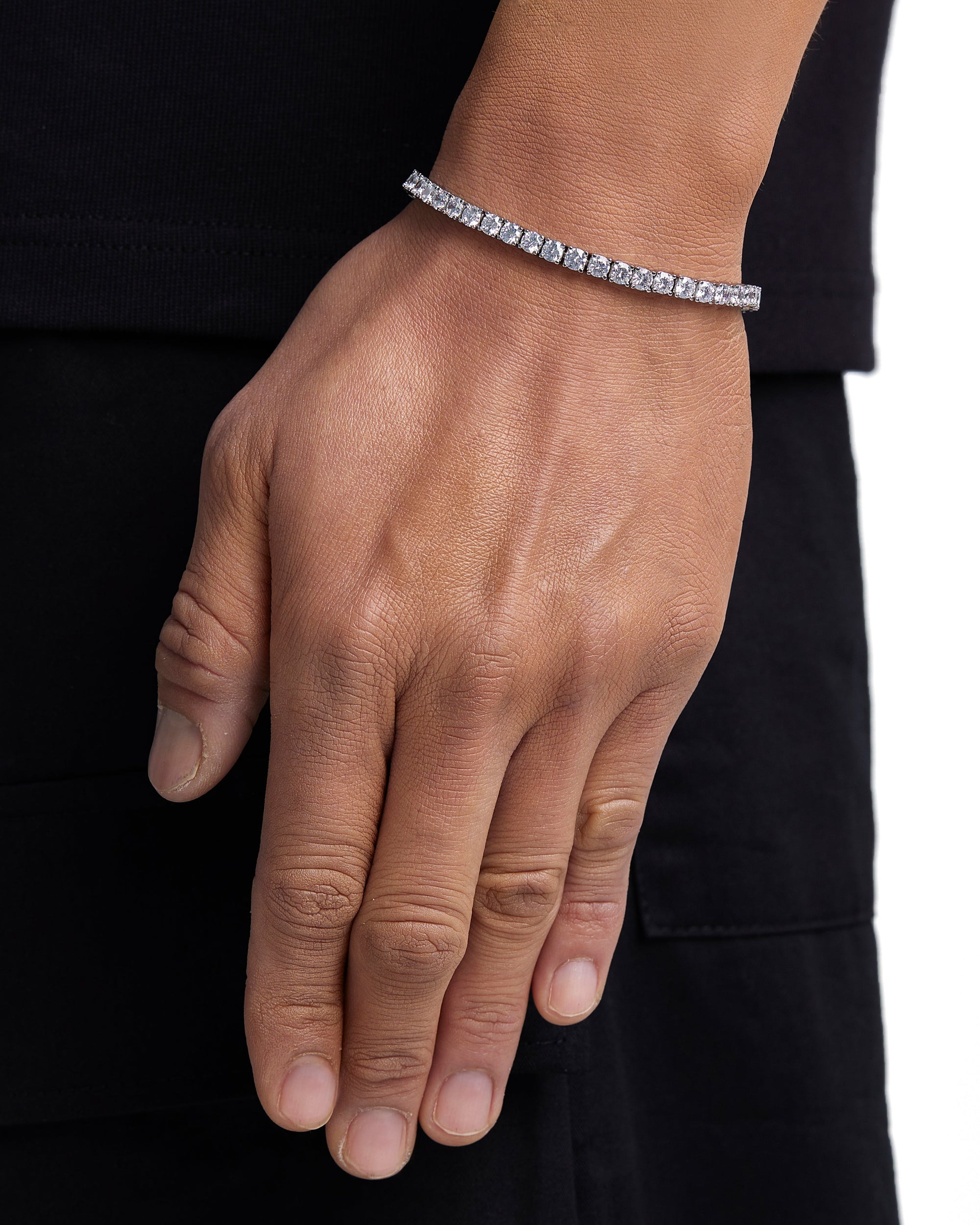 Model wearing 4mm white gold ice sparkler tennis chain set by Iceman Society, side view