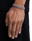 Model wearing 12mm white gold iceman cuban chain set by Iceman Society, side view