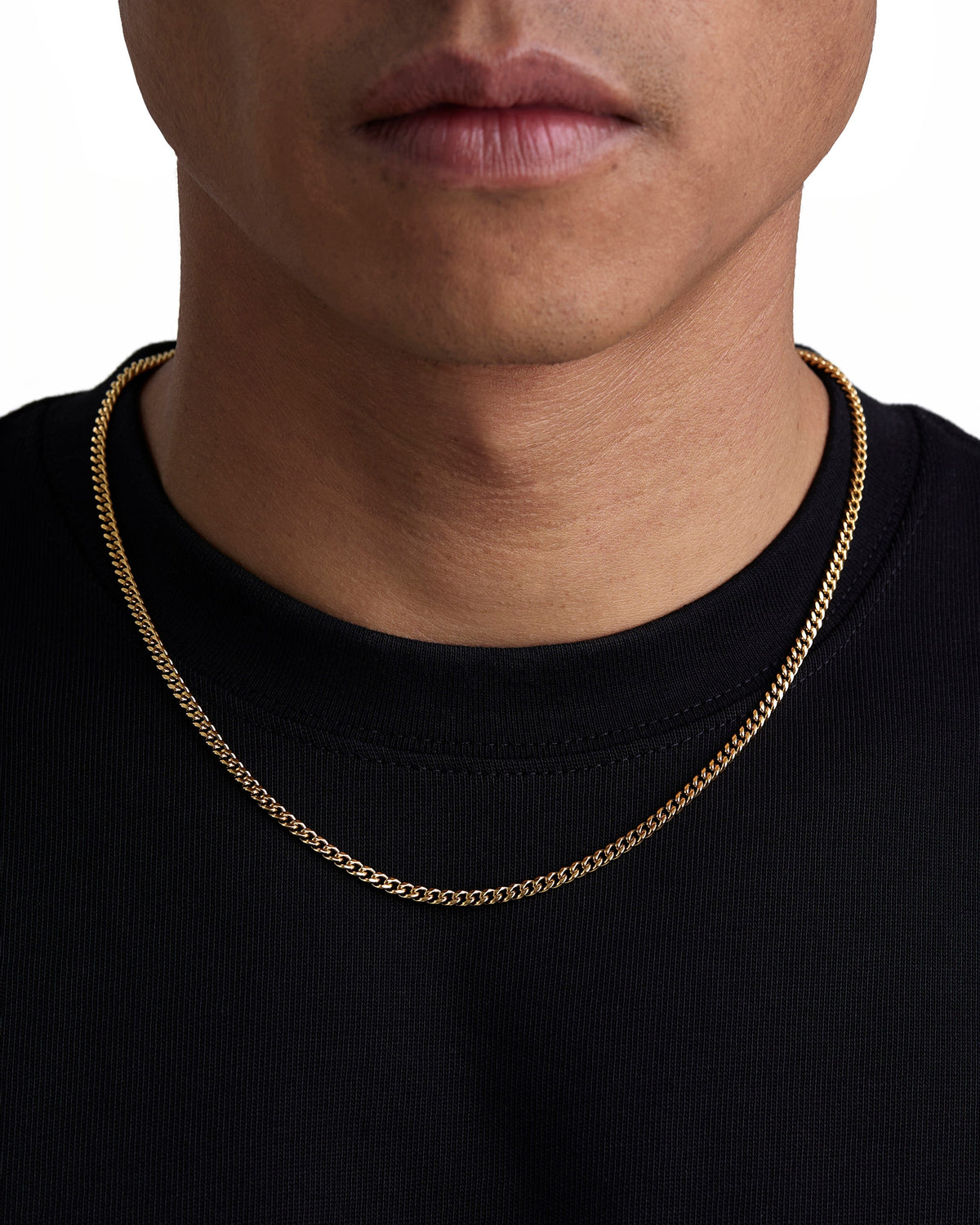 Model wearing 3mm 18K gold plain cuban chain set by Iceman Society, front view