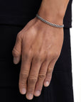 Model wearing 5mm white gold plain cuban chain set by Iceman Society, side view
