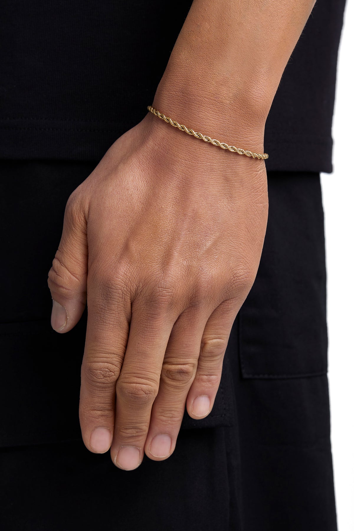 Model wearing 3mm 18k gold rope bracelet by Iceman Society
