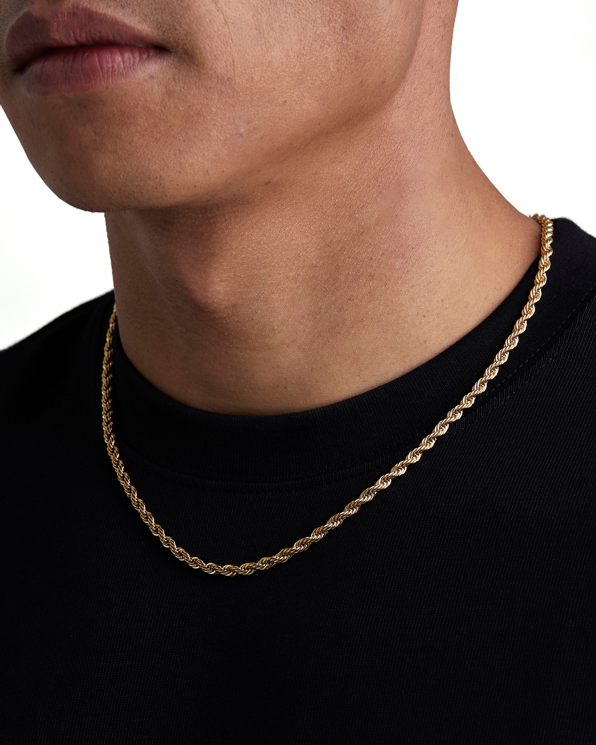 Model wearing 4mm 18k gold rope necklace by Iceman Society, side view