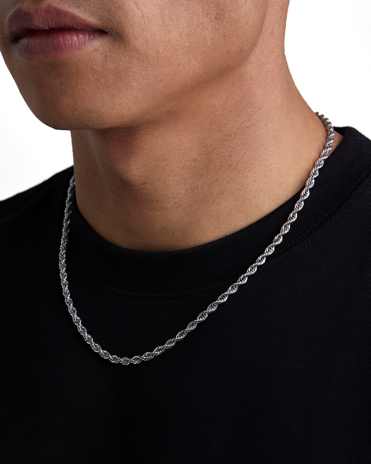Model wearing 4mm white gold rope necklace by Iceman Society, side view